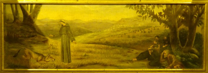 Pedrel·la representativa de l'episodi del llop de Gubbio, de l'església parroquial de Sineu.